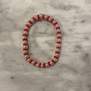 Kid’s size, res and white bracelet